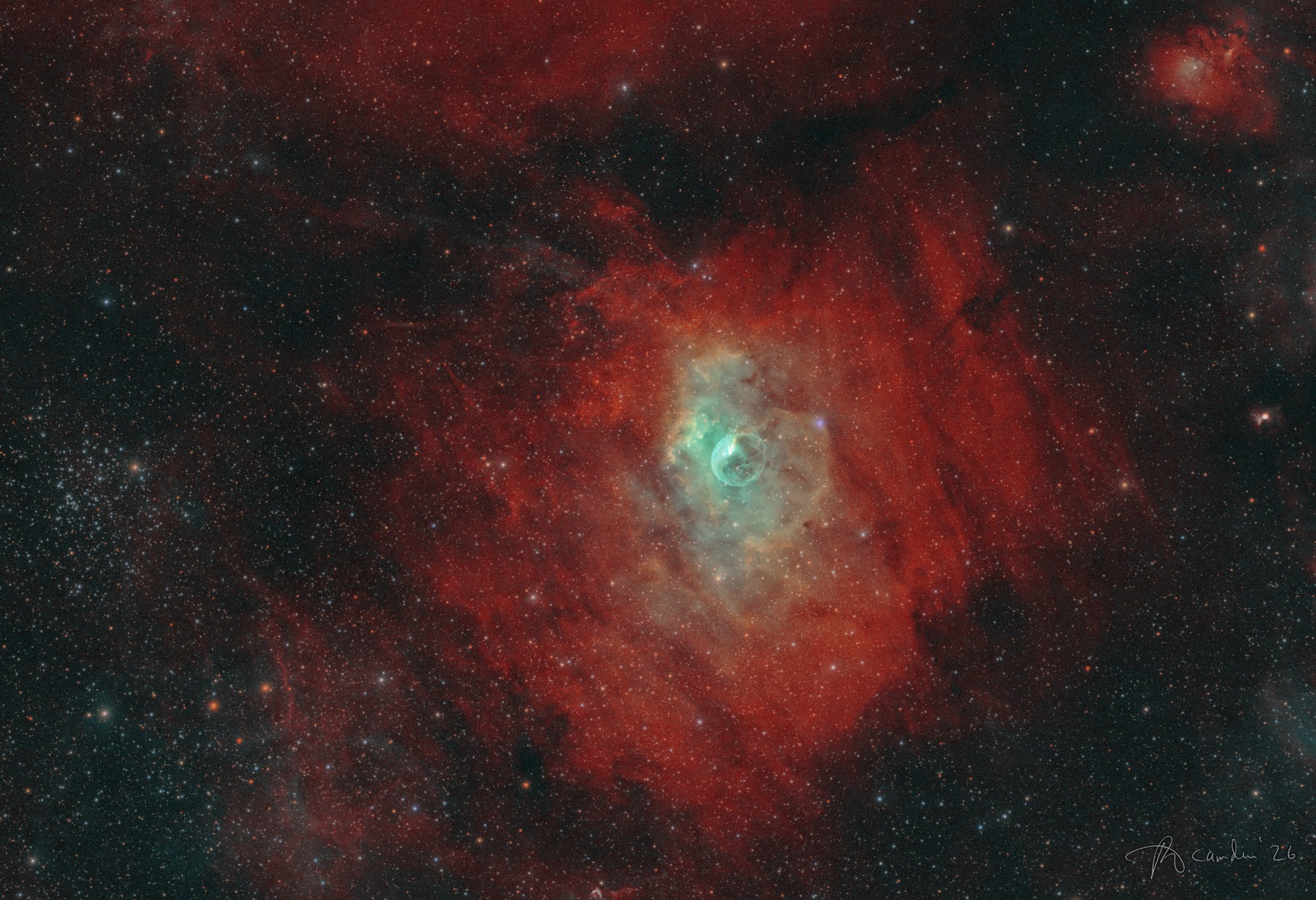 The Bubble Nebula, NGC 7635 — a small cyan shell at the centre of a large red hydrogen cloud, with the star cluster M52 at left and the small nebula Sh2-159 at top right